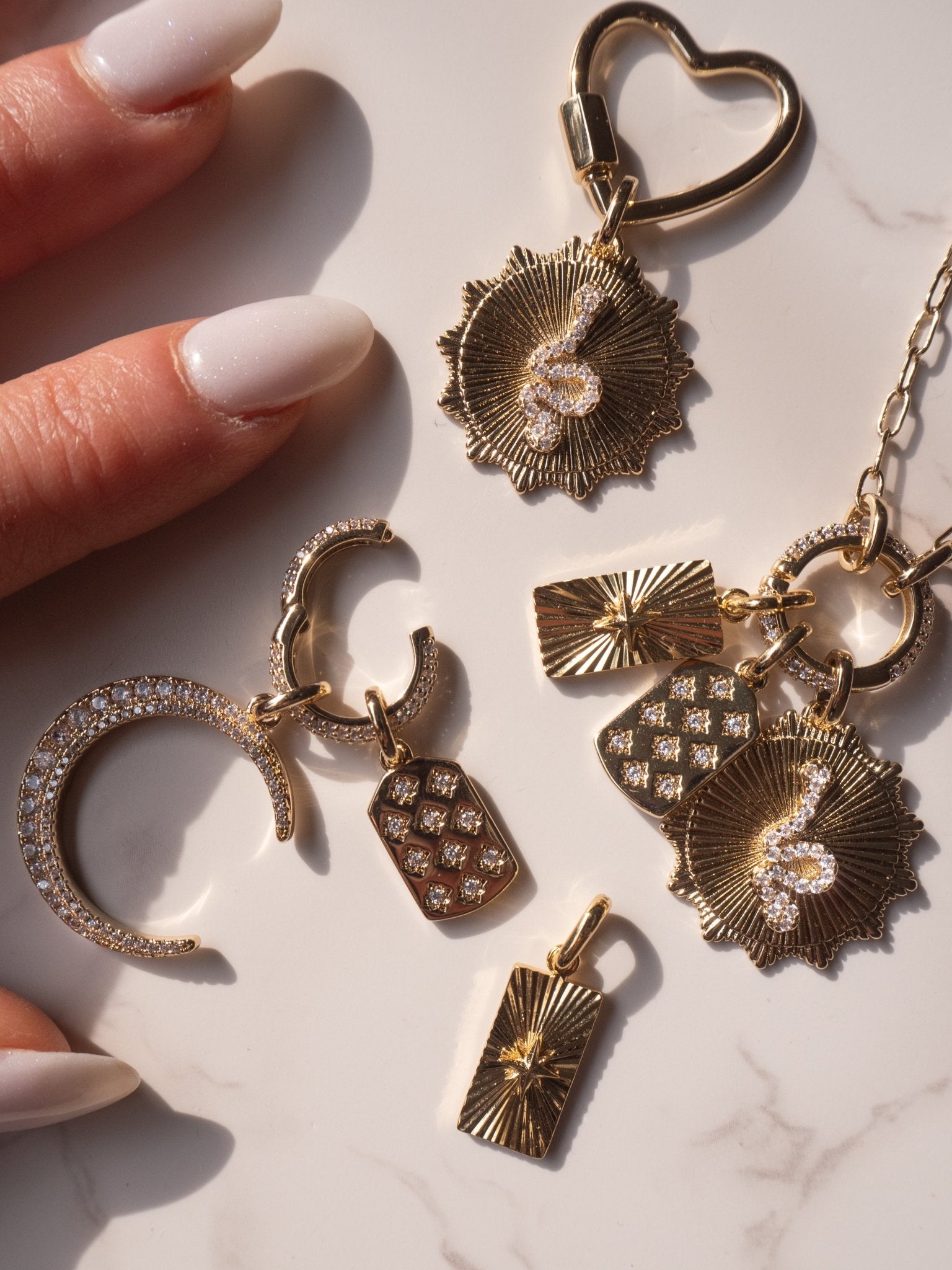 Calypso charm - five and two jewelry