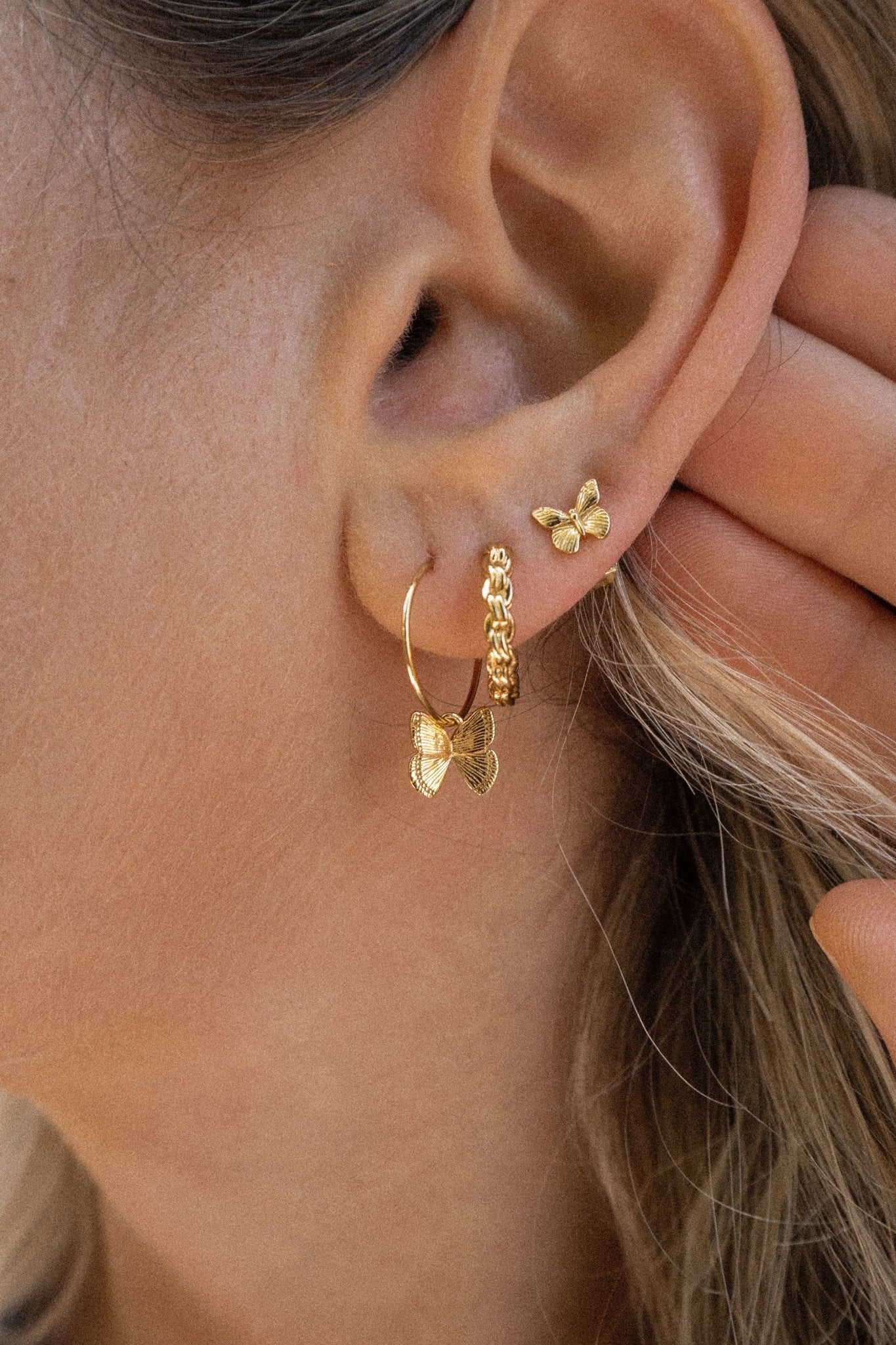 mini gold delicate gold butterfly earring studs