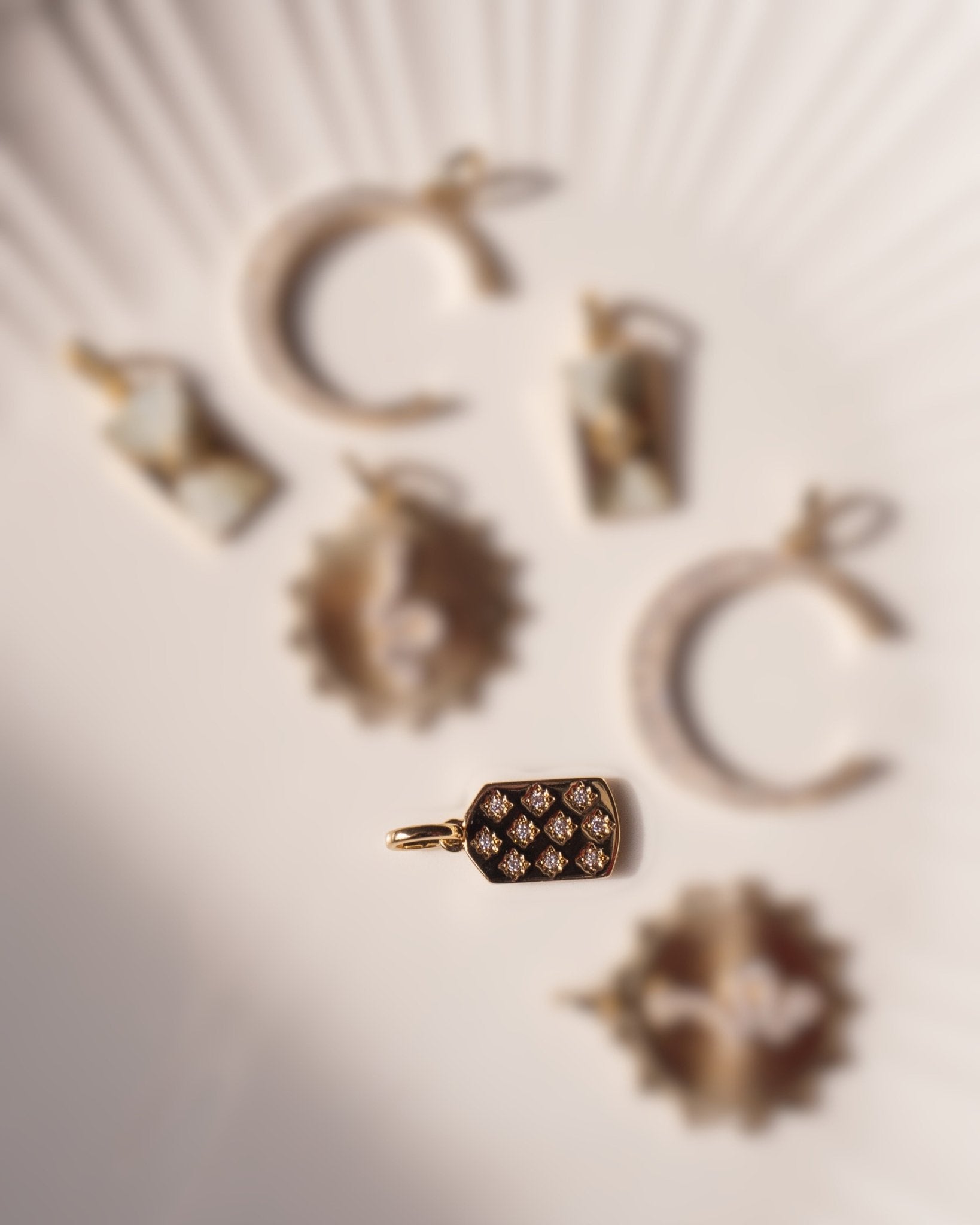Tinsley charm - five and two jewelry